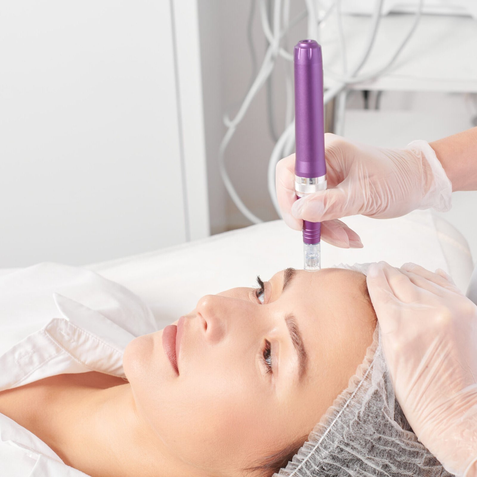 Beautician makes mesotherapy injection for rejuvenation woman face, procedure in beauty salon Beautician makes mesotherapy injection for rejuvenation woman face, anti aging non surgical cosmetic procedure in beauty salon. Cosmetologist hands in gloves makes facial micro needle injections